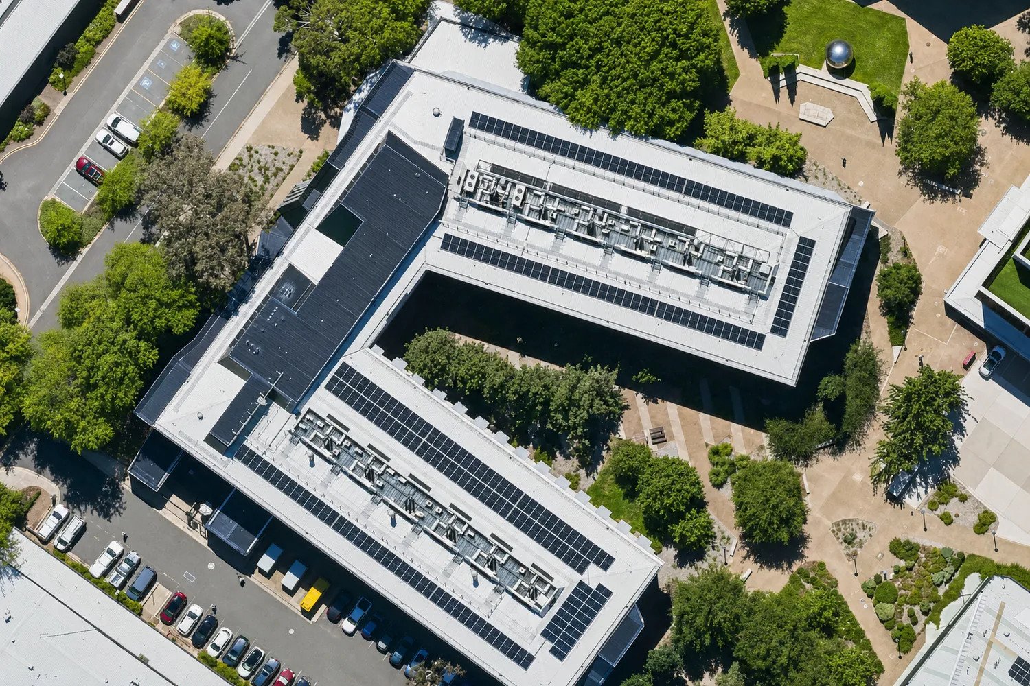 ANU Campus Solar Installation Aerial view of solar panels installed by SolarHub on an ANU campus building